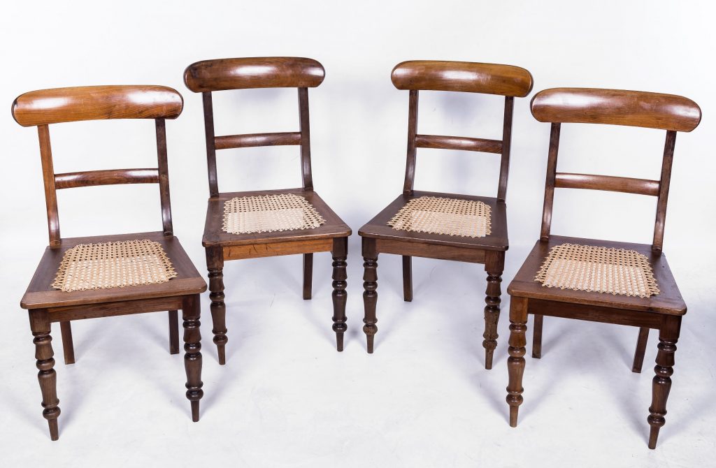 Four cane seated chairs from larger set