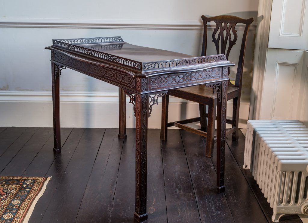 Pierced and blind pierced mahogany writing table